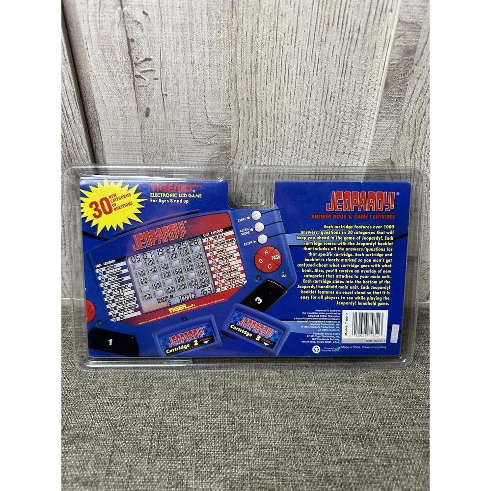Tiger Jeopardy Handheld Electronic Game w/ 3 Cartridges & Question Answer Books